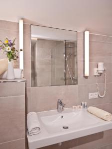 Kúpeľňa v ubytovaní Hotel Neuwirt