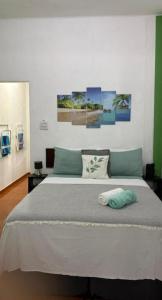 Studio Encantado De Copacabanaにあるベッド