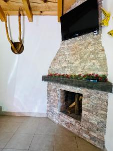 Μια τηλεόραση ή/και κέντρο ψυχαγωγίας στο Cabaña el roble