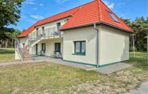 a house with an orange roof at Beautiful Apartment In Altenkirchen in Altenkirchen
