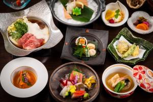 a group of plates of food on a table at Hotel Nanpuso in Hakone