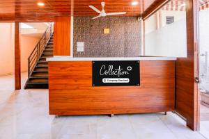 Πιστοποιητικό, βραβείο, πινακίδα ή έγγραφο που προβάλλεται στο Collection O Khoni Taloja Bypass