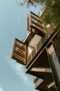 a building with balconies on the side of it at Vessel Hostel in San Juan