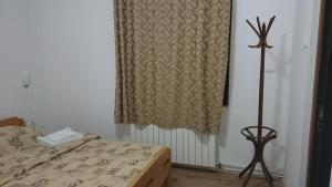 Letto o letti in una camera di Musical Pansion Radgost, Rtanj