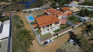 an overhead view of a house with a roof at Pousada Solar Da Lagoa - Baixio BA in Baixio