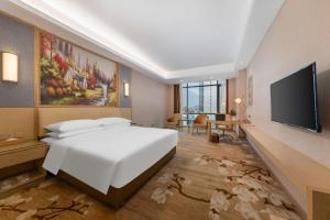 TV/trung tâm giải trí tại Venus International Hotel Guangdong Foshan Longjiang Exhibition Center 2nd Branch