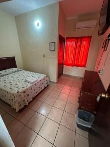 Gulta vai gultas numurā naktsmītnē Hotel D´ Carmona
