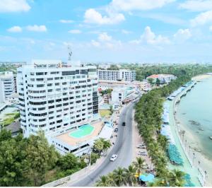 an aerial view of a city with a beach and buildings at Sea View and Hill View Room for 6 Guests, Bangsaen Royal Beach by Cozy Corner in Ban Laem Thaen