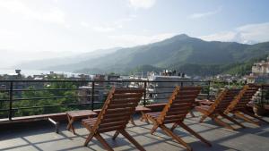 A balcony or terrace at Hotel Middle Path & Spa
