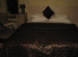 Postel nebo postele na pokoji v ubytování Family Hotel Kartala