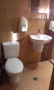 Koupelna v ubytování Family Hotel Kartala