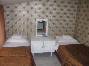 Postel nebo postele na pokoji v ubytování Family Hotel Kartala