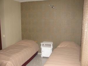 Postel nebo postele na pokoji v ubytování Family Hotel Kartala