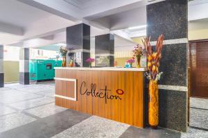 a lobby with a coffee station in a building at Super Collection O Rio Kondapur Near Rahavendra Colony in Hyderabad