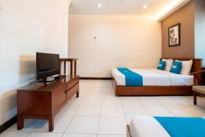 TV a/nebo společenská místnost v ubytování Rehat at Hotel 10 Buah Batu