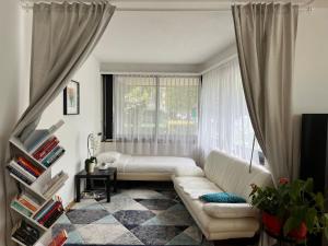 Χώρος καθιστικού στο 4Room Modern Apartment Next to Park Hyatt Zürich