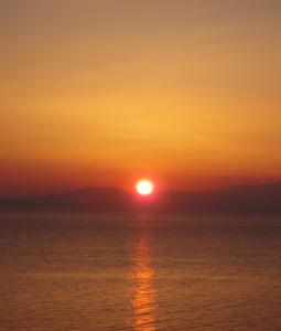 The sunrise or sunset as seen from az üdülőtelepeket or nearby