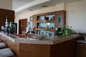 a kitchen with a counter with a bowl on it at Guest House Golden Flake 4km from Bolata beach in Bŭlgarevo