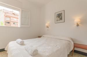 Postel nebo postele na pokoji v ubytování Hostal Cruz