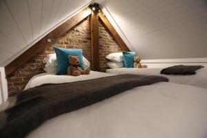 A bed or beds in a room at Blacksmiths Clayworth 