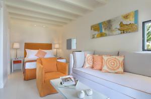 Kama o mga kama sa kuwarto sa Mareggio Exclusive Residences & Suites