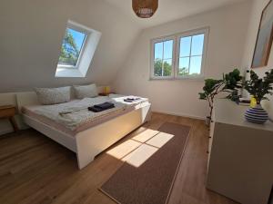 Katil atau katil-katil dalam bilik di Ferienhaus am See mit Sauna +20 gambar