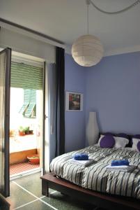 A bed or beds in a room at Il Riposo del Guerriero Guesthouse