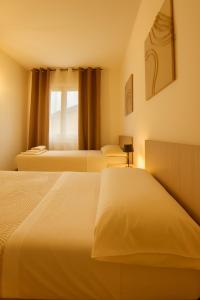 Φωτογραφία από το άλμπουμ του Garda Lake Holiday Apartments quadrilocale σε Cavalcaselle