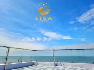 a view of the ocean from the usa hotel at Lisa Hotel Thiên Cầm in Cẩm Xuyên