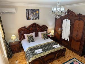 Ένα ή περισσότερα κρεβάτια σε δωμάτιο στο Ala s Old District Apartment +5 φωτογραφίες