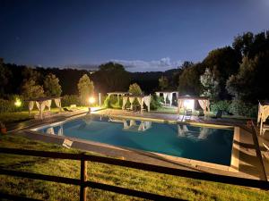 Bazén v ubytování Agriturismo La Burraia vicino a San Gimignano-Air conditioning-EV wallbox nebo v jeho okolí