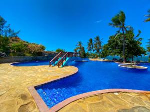 Bazén v ubytování Jujo Beachfront Apartment's nebo v jeho okolí