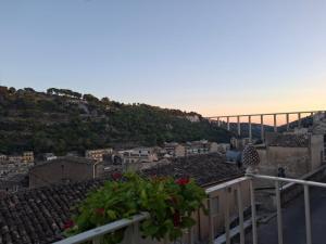 a view of a city from the roof of a building at La Dimora Sicula in Modica
