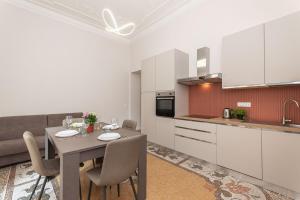 Kuchyň nebo kuchyňský kout v ubytování Rosa House free WiFi, AC