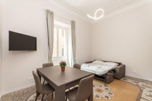 TV a/nebo společenská místnost v ubytování Rosa House free WiFi, AC