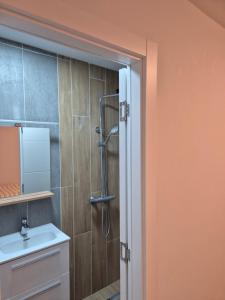 a bathroom with a shower and a sink at Hygge-Kuca in Neum +65 photos