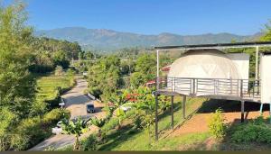 a view of a road and a building with a view of a road at ข้างเขาแคมป์ Khangkhao Camp in Ban Yang Khun Wang
