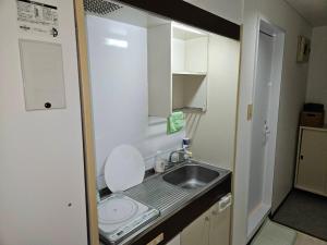 Dapur atau dapur kecil di ホテルレスポワール401 +36 gambar