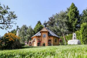Vonkajšia záhrada v ubytovaní Alps Residence