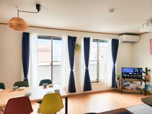 Μια τηλεόραση ή/και κέντρο ψυχαγωγίας στο BBQ可能1棟まるまる貸し切り 最大12名 家族 友人でゆっくりすごせます Morley1