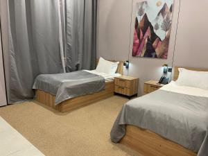 Ένα ή περισσότερα κρεβάτια σε δωμάτιο στο AIRIS Residence +81 φωτογραφίες