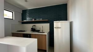 Η κουζίνα ή μικρή κουζίνα στο Flat Paradise +2 φωτογραφίες