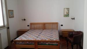 Postel nebo postele na pokoji v ubytování Emi Apartment