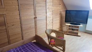 Μια τηλεόραση ή/και κέντρο ψυχαγωγίας στο Ferienhaus am See