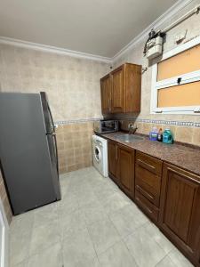 Η κουζίνα ή μικρή κουζίνα στο Furnished Apartment 3BR 2BA Excellent Condition +12 φωτογραφίες