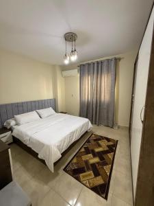 Ένα ή περισσότερα κρεβάτια σε δωμάτιο στο Furnished Apartment 3BR 2BA Excellent Condition