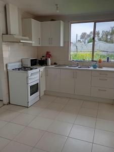 Kuchyň nebo kuchyňský kout v ubytování Relax holiday room