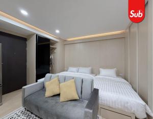 Postel nebo postele na pokoji v ubytování Modern & Luxury Room in Hat Yai