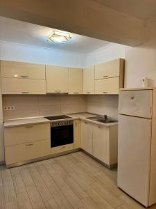 Nhà bếp/bếp nhỏ tại District 50 Apartment