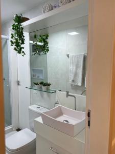 Ένα μπάνιο στο Flat av beira mar lindo e aconchegante